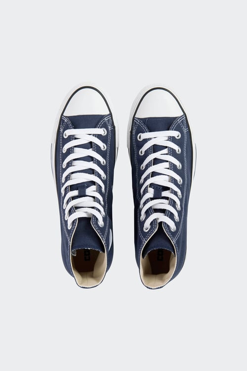 Converses montantes bleues sales