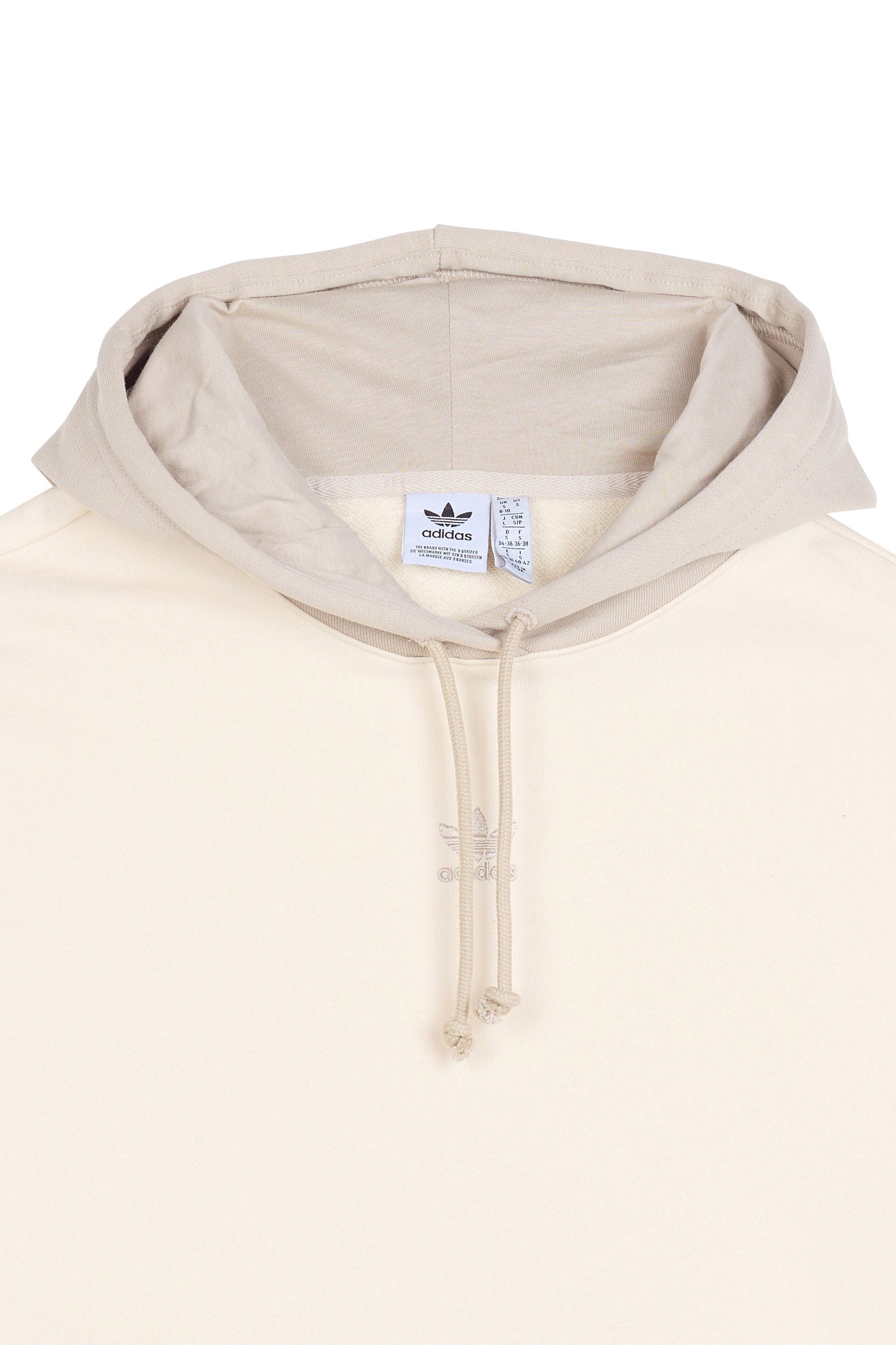 - Coupe ample- Col à capuche avec cordon de serrage- Manches longues- Poche kangourou - Logo brodé sur poitrine  Beige