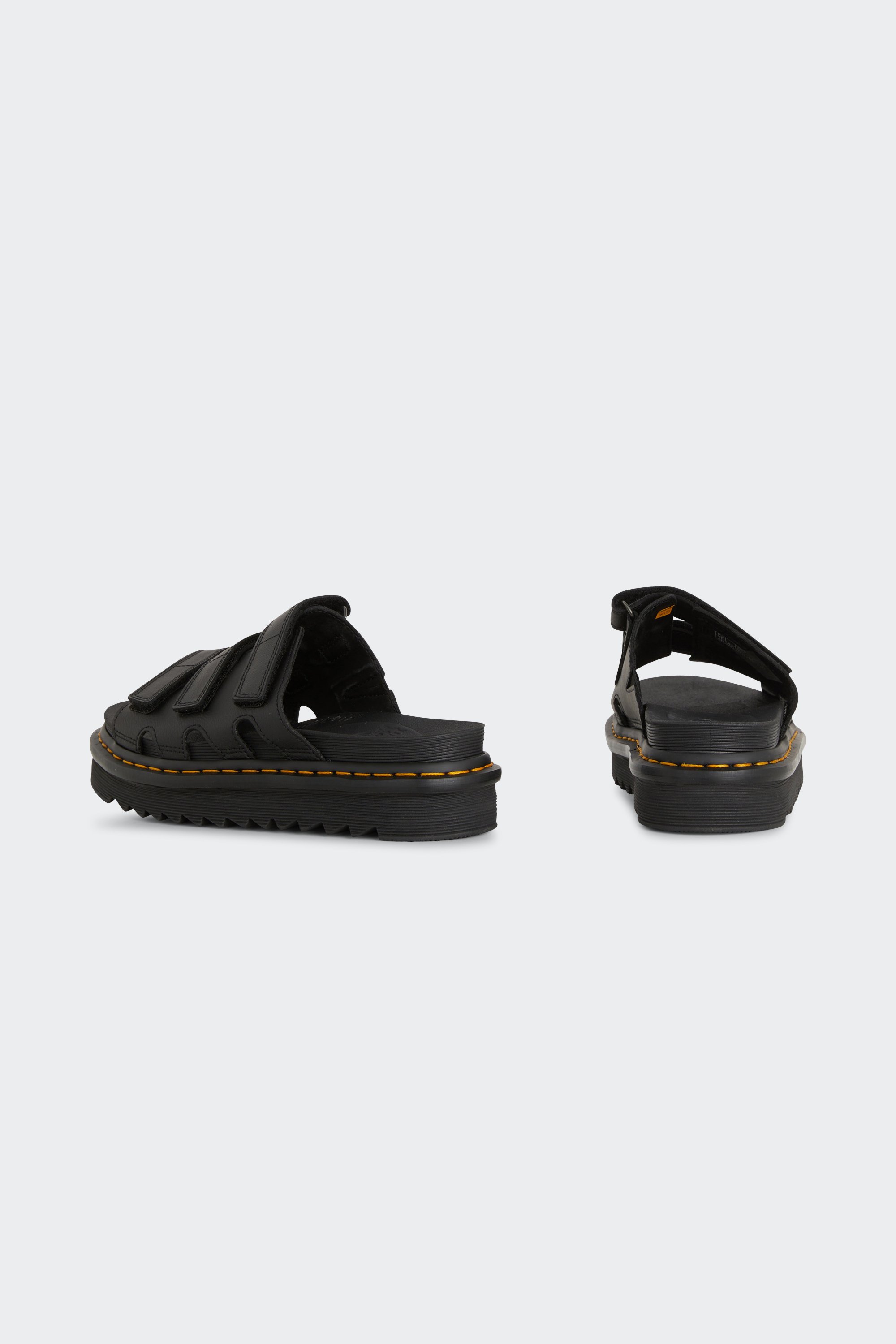 Flat furry sheepskin sandals | Black by DR. MARTENS Flat furry sheepskin sandals Black