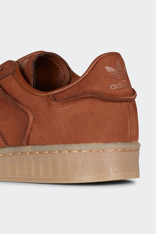Adidas superstar homme marron sales