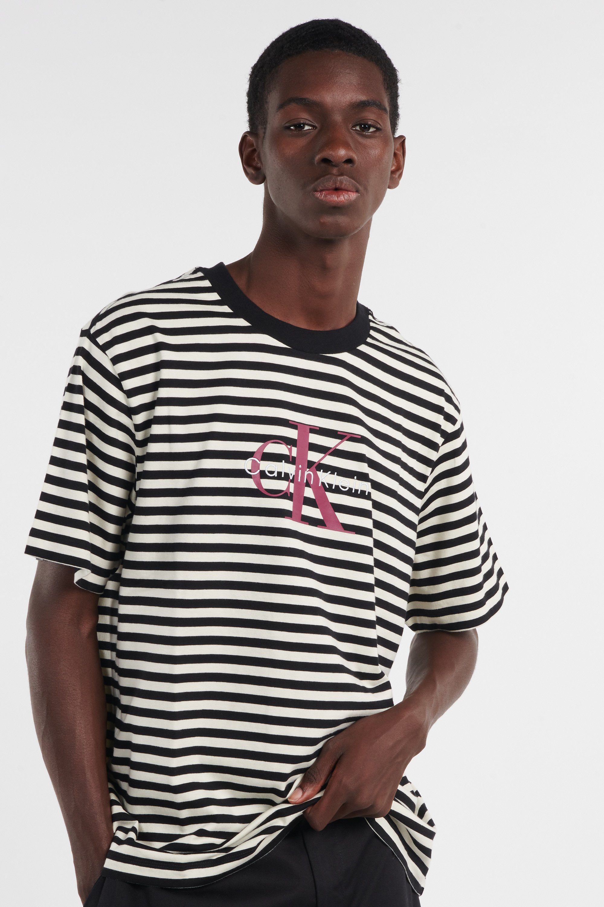 Regular-fit round-neck cotton T-shirt | Black by CALVIN KLEIN Regular-fit round-neck cotton T-shirt Black