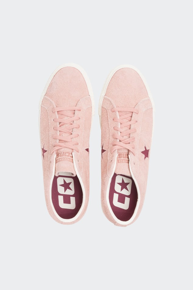 Converse basse cuir rose hot sale