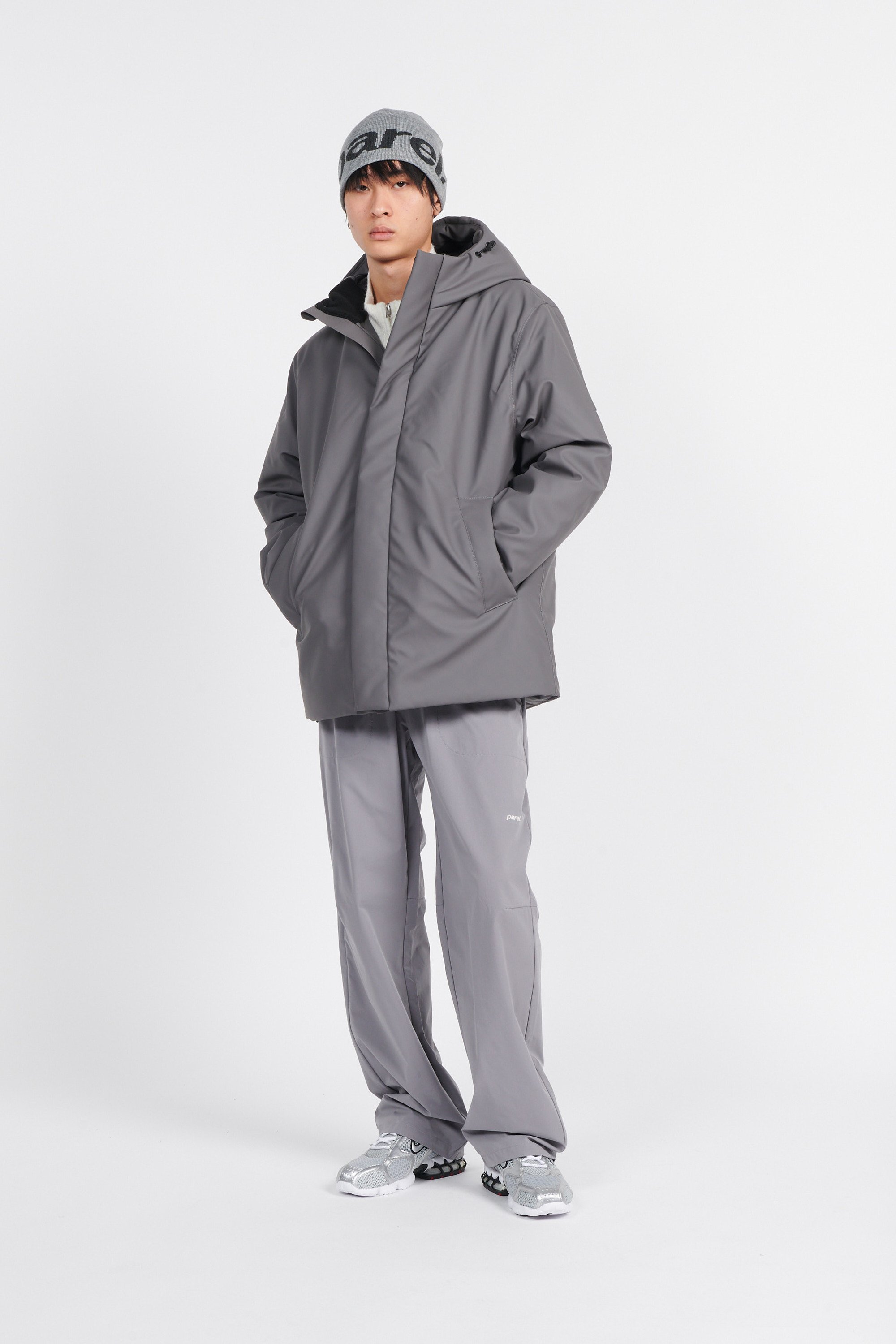 Lightweight quilted padded jacket with high neck | Grey by RAINS Lightweight quilted padded jacket with high neck Grey