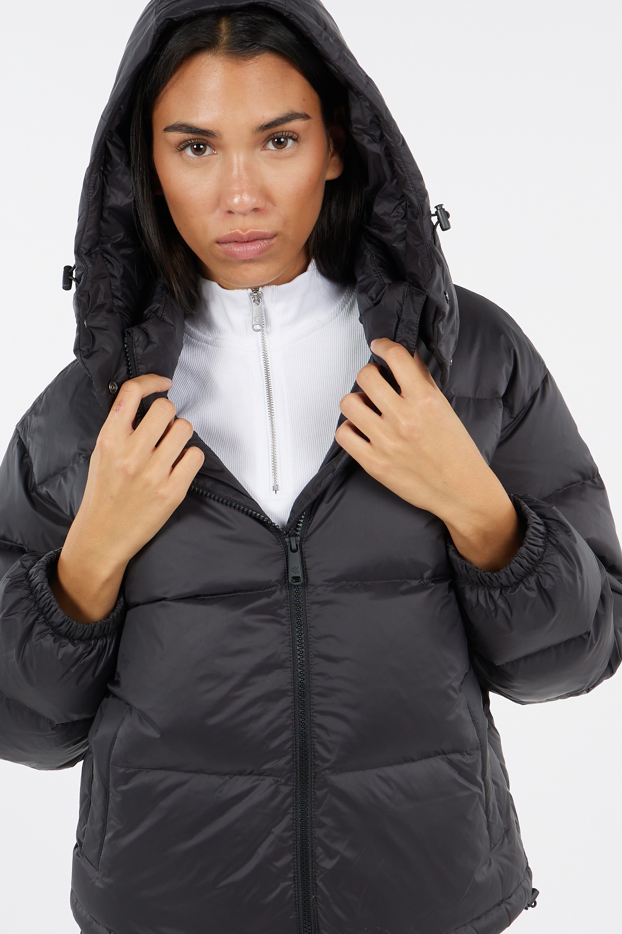 Lightweight quilted padded jacket with high neck | Black by CALVIN KLEIN Lightweight quilted padded jacket with high neck Black