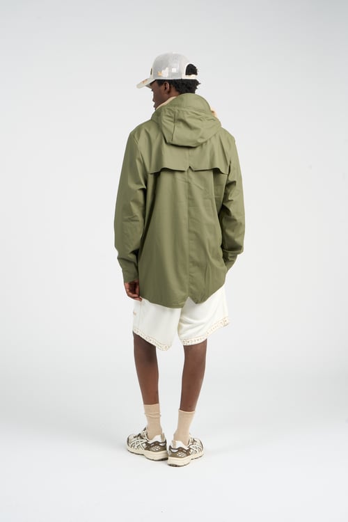RAINS Coupe-vent imperméable à capuche Vert