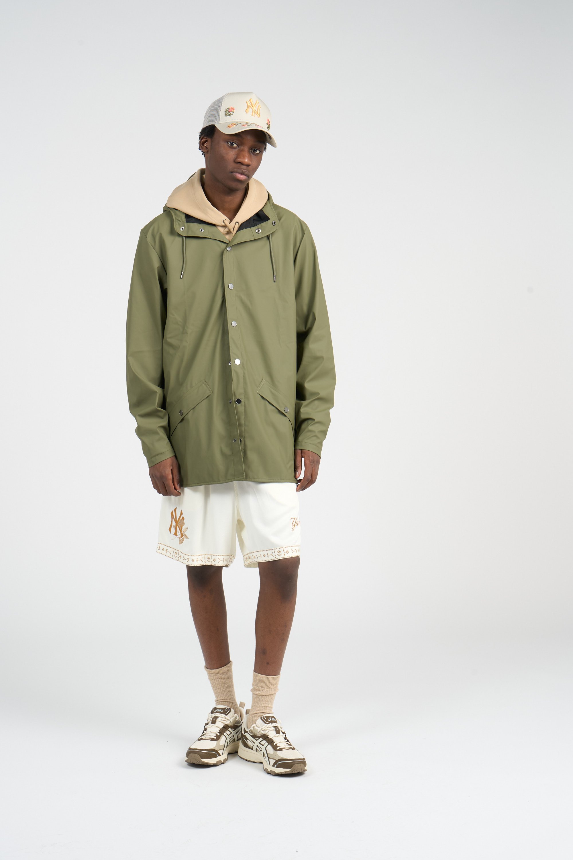 Hooded waterproof windbreaker RAINS Green