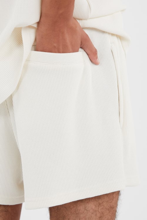 NEW ERA Shorts Beige