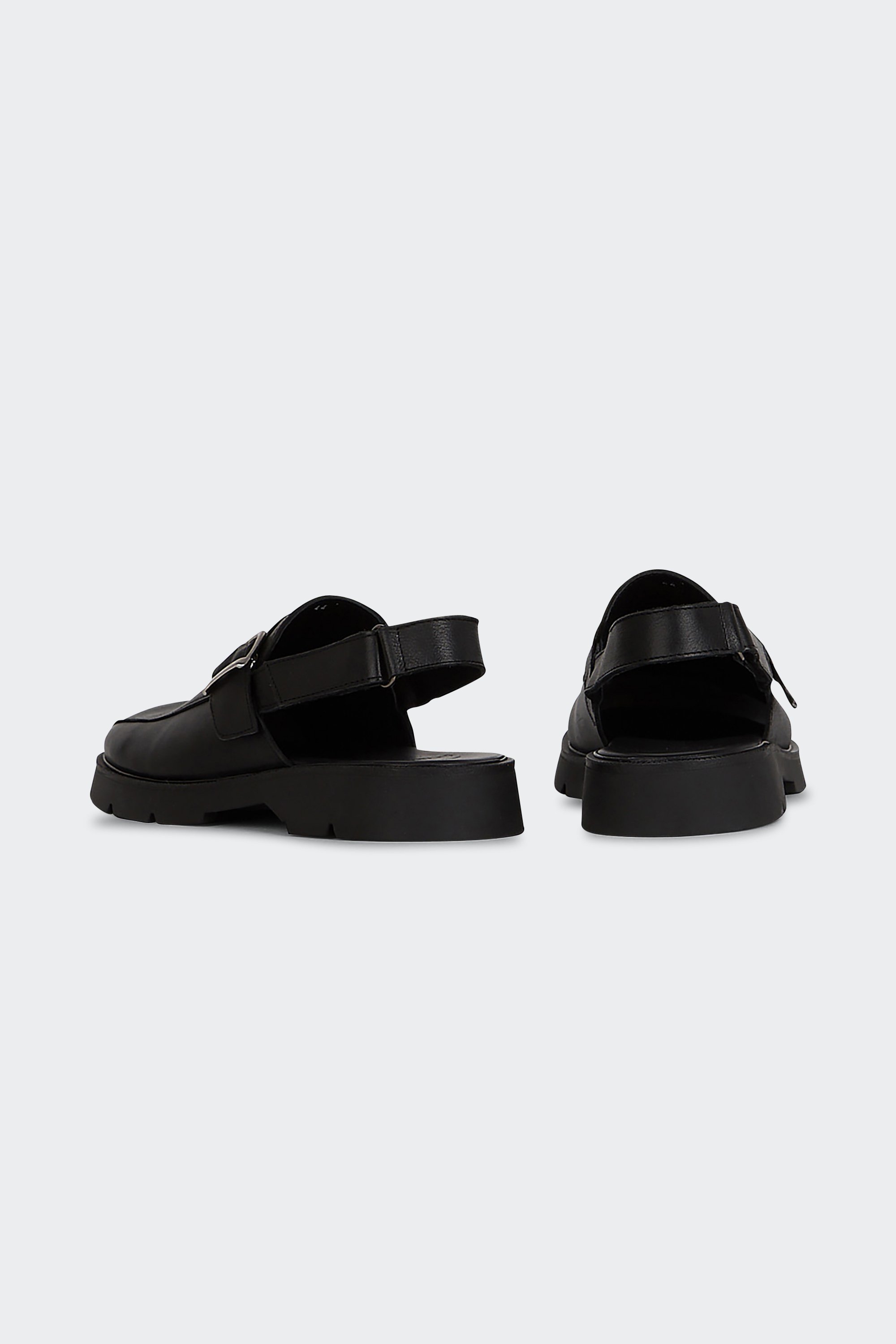 Flat furry sheepskin sandals | Black by KLEMAN Flat furry sheepskin sandals Black