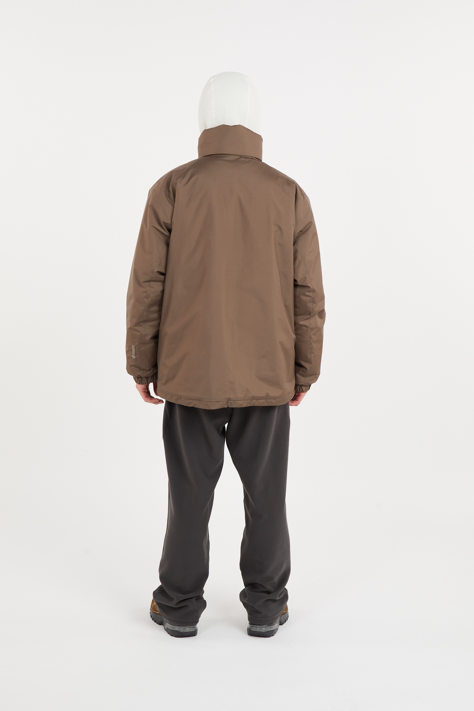 Lightweight quilted padded jacket with high neck Brown