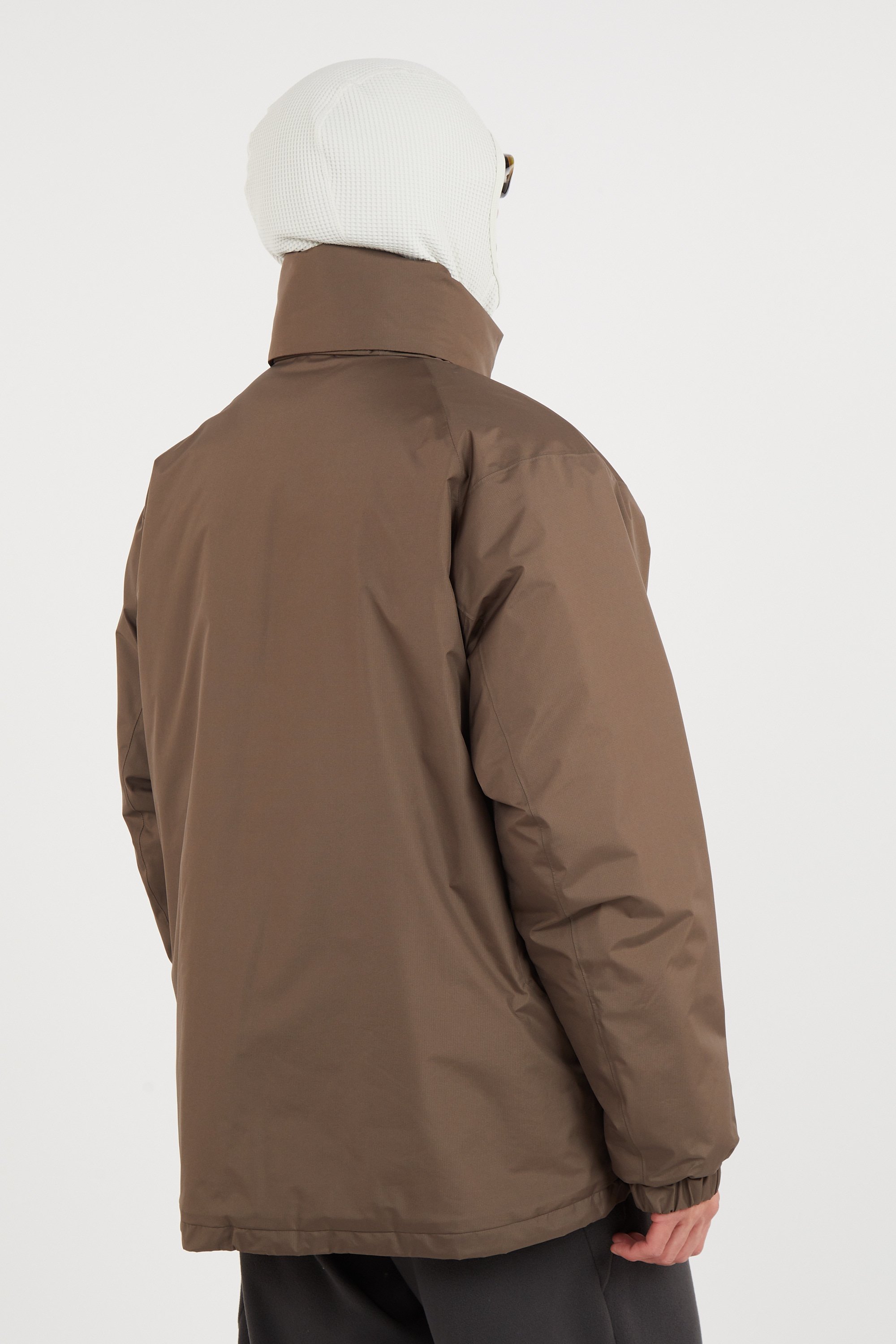 Lightweight quilted padded jacket with high neck Brown