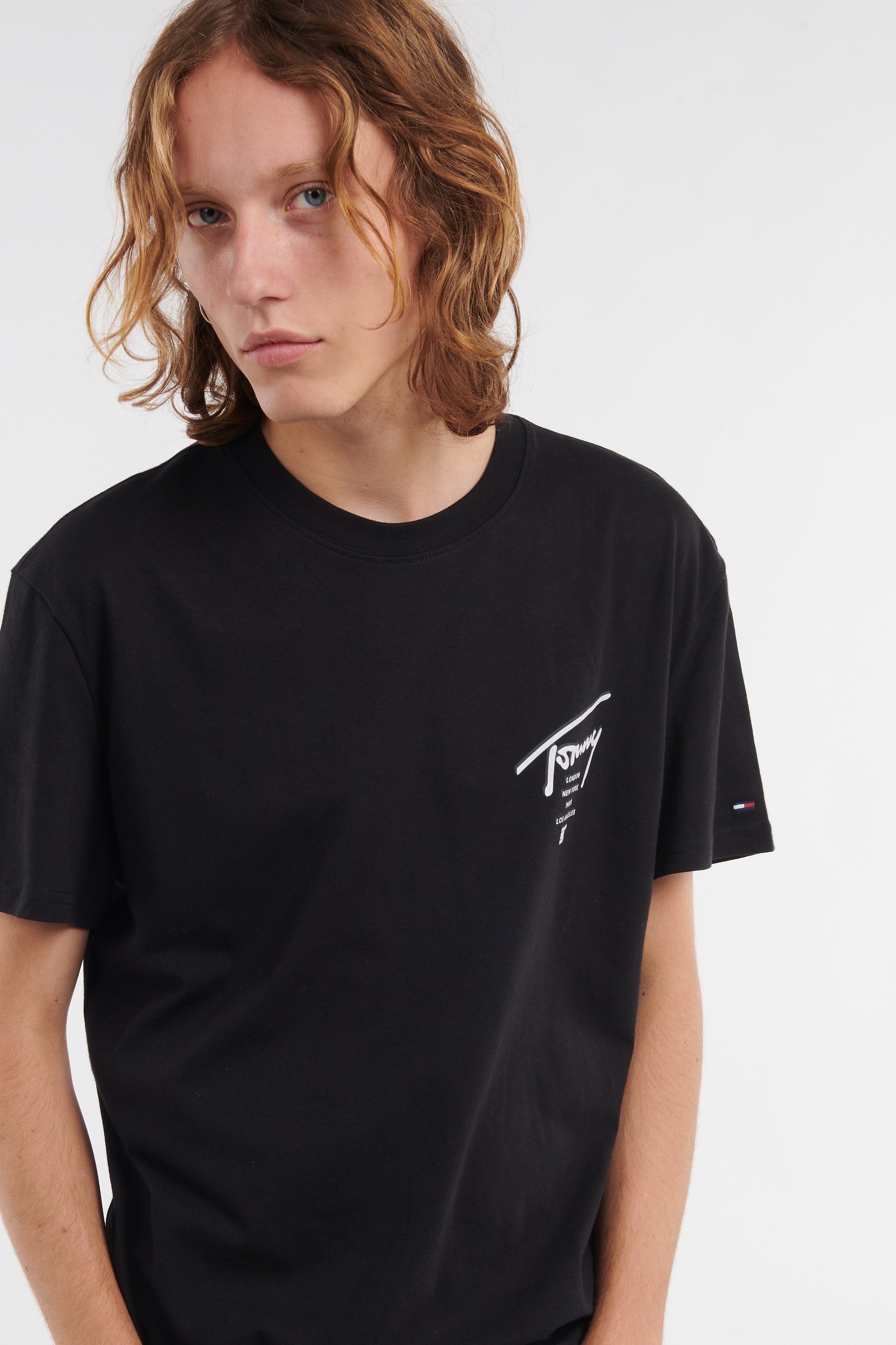 Regular-fit round-neck cotton T-shirt | Black by TOMMY JEANS Regular-fit round-neck cotton T-shirt Black