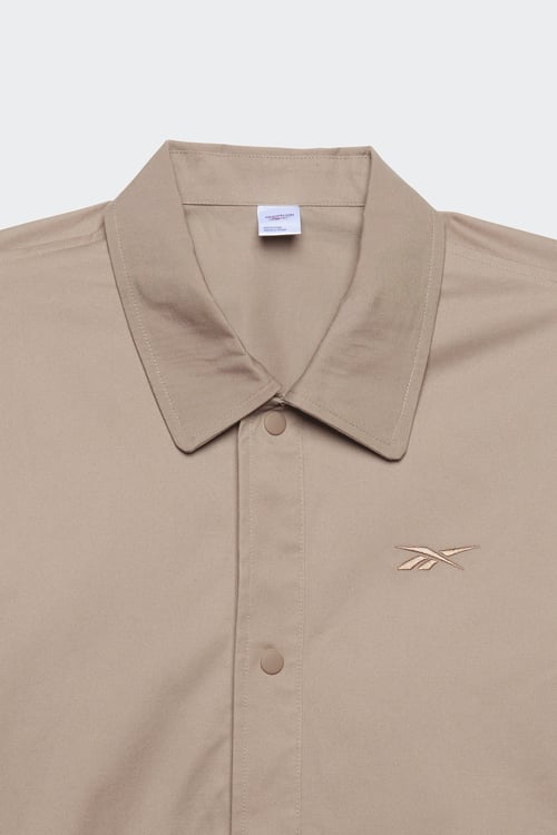 Polo reebok deals femme marron