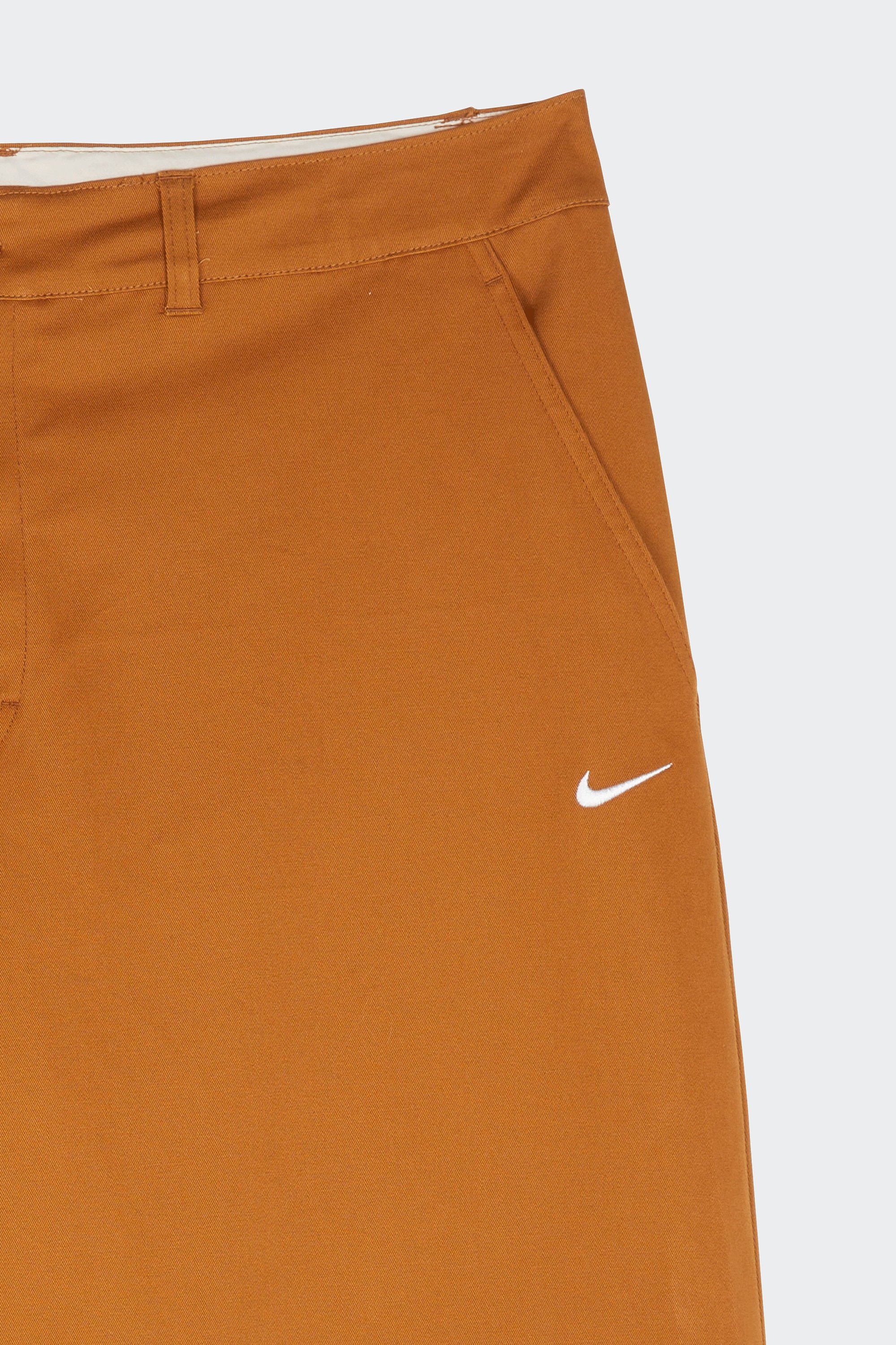 Trousers | Brown by NIKE Trousers Brown
