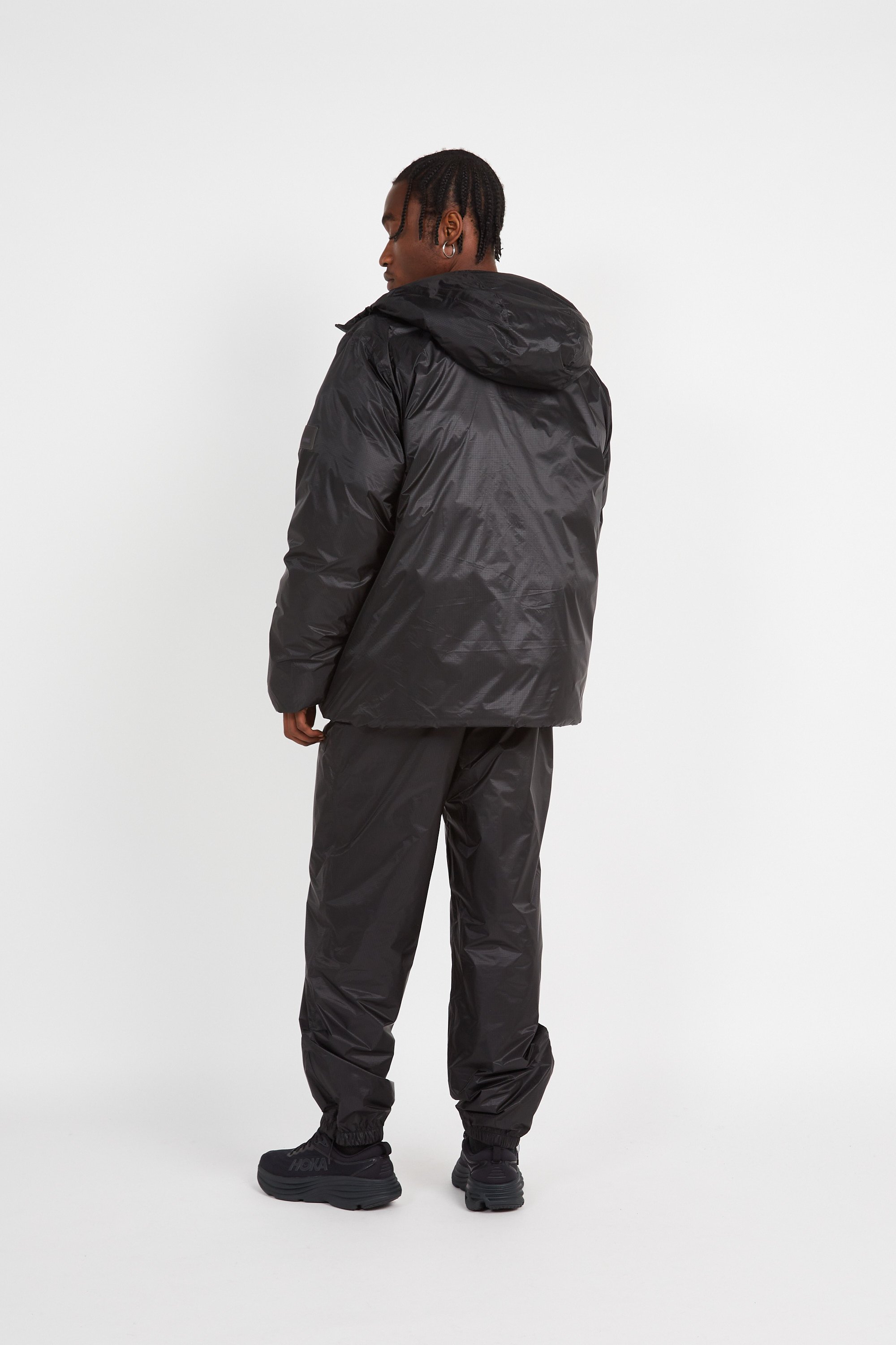 Lightweight quilted padded jacket with high neck | Black by RAINS Lightweight quilted padded jacket with high neck Black